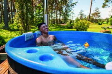 Person Sitting In Hot Tub