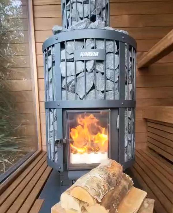 🔥Isn't this fire absolutely stunning?🔥⁠
⁠
Check out one of our spacious wood-fired sauna installations showcasing the Harvia Legend 240 Green Flame heater, which beautifully combines striking aesthetics, impressive performance and the genuine allure of a classic sauna experience.🪵🧖‍♀️✨ ⁠
⁠
Feel the flames dance gracefully behind the expansive glass panel while soaking in the enchanting, soothing atmosphere that only a genuine wood-burning heater can offer.⁠
⁠
Unwind. De-stress. Celebrate the legend.⁠
⁠
Curious about the various heating options we offer for our saunas? Don’t hesitate to reach out to our friendly team we’re more than happy to assist you in selecting the ideal fit for your sauna at 01748898303🔥⁠
⁠
#KiramiUK #HarviaLegend #GreenFlame #WoodFiredSauna #SaunaLife #LuxurySauna #OutdoorLiving #Wellness #ScandinavianStyle #SaunaExperience #HomeSpa #Relaxation #SaunaTime #GardenRoom #WoodBurningSauna
